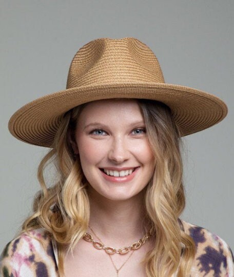 Gorgeous featuring a double trim with animal print and wide brim with inner adjustable band panama hat